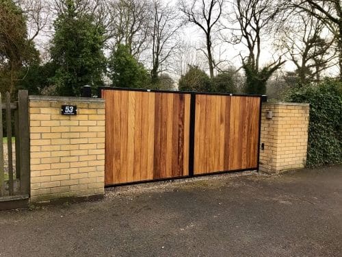 Wooden driveway gates with metal frame